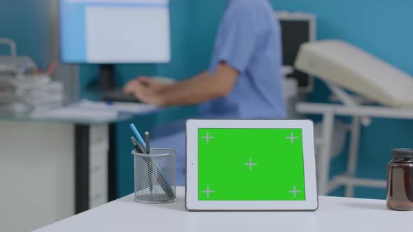 Closeup of Mock Up Green Screen Chroma Key Tablet Computer with Isolated Display