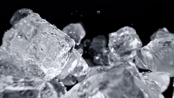 Super Slow Motion Shot of Ice Cubes Flying Towards Camera at 1000Fps