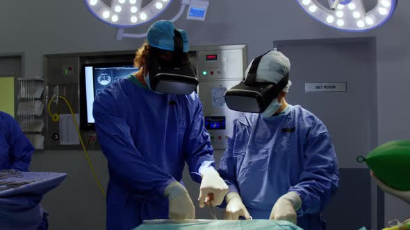 Surgeons using virtual reality headset 4k