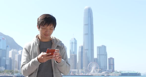 Man Use of Cellphone in Hong Kong