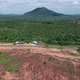 4K Cinematic aerial view of bauxite land with Mountain - VideoHive Item for Sale