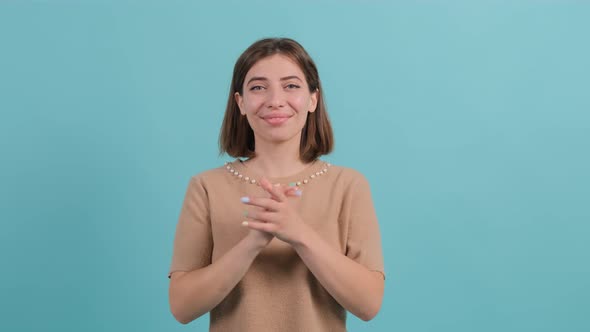 Applauding Young Pretty Girl, Clapping Over Turquoise Background