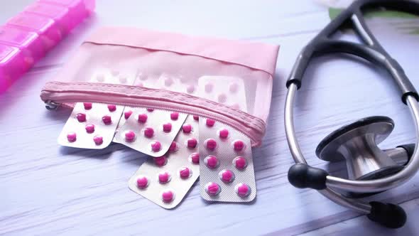 Close Up of Pills, and Stethoscope on Table with Copy Space 