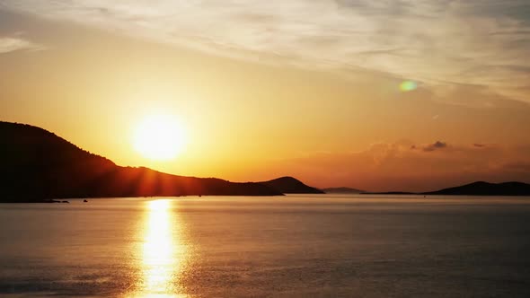 Sunrise Behind Silhouetted Mountains