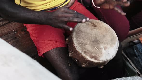 Local Africans Playing Drums on Traditional Dhow Boat at Trip Zanzibar