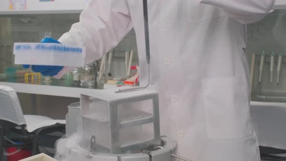 Laboratory Samples are Taken From a Liquid Nitrogen Fridge