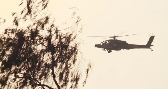 Apache Longbow military helicopter during combat flight