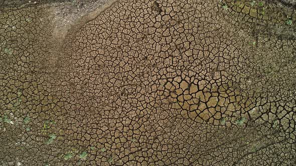 Dry and cracked land during dry season