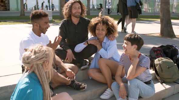 Stylish Multiethnic Friends Chilling on Street