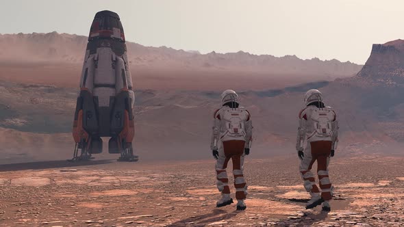 Astronaut Wearing Space Suit Walking on the Surface of Mars alt