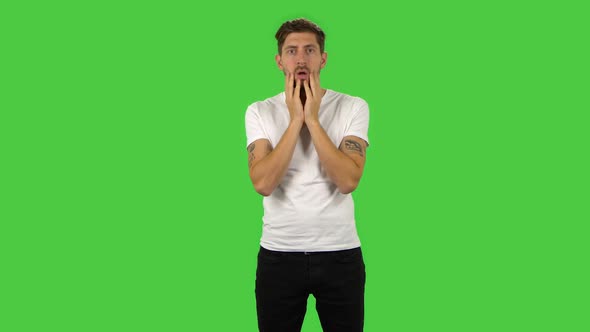 Confident Guy with Shocked Surprised Wow Face Expression. Green Screen