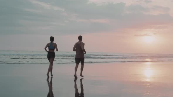 Sports People Jogging at Sunset