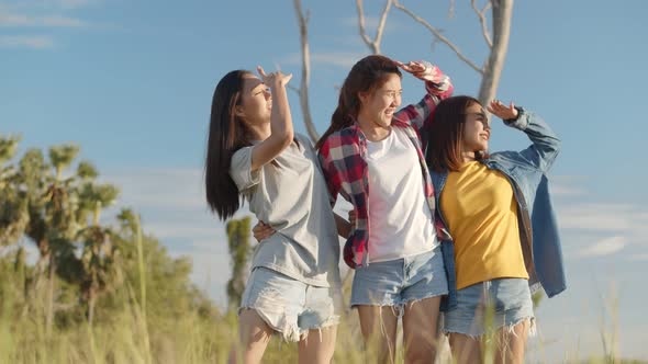 Group of a young Asian women looks to view the mountain and having fun together a summer traveling.