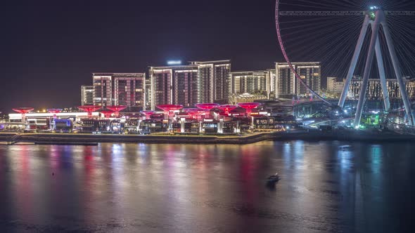 Bluewaters Island in Dubai Aerial Night Timelapse with Illuminated Buildings