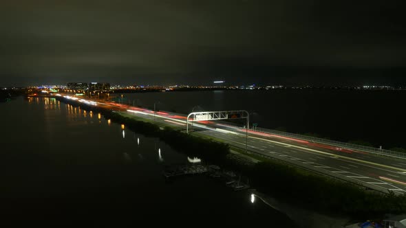 Tampa Bay Causeway at Night Time Lapse with Planes Landing