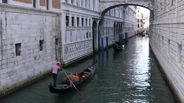 Gondolas under the bridge of sighs in Venice, Italy, Europe