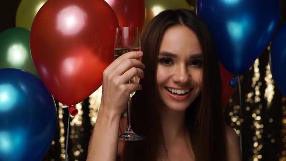 Happy Woman Celebrating Birthday Party With Champagne, Balloons