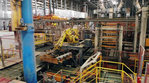 Timelapse of Robotic Arm, Industrial Transporting Equipment at the Factory