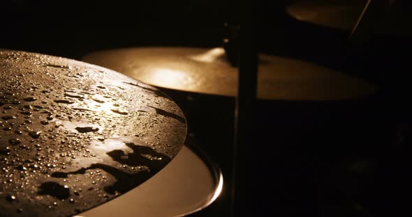 Drummer playing drum in studio