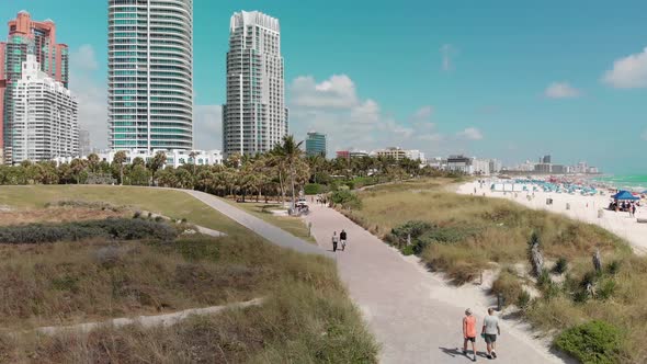 Miami Beach From South Pointe Park Slow Motion Aerial View on a Beautiful Sunny Day