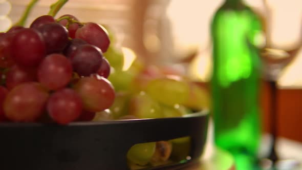 Grapes in the Black Bowl Rolling