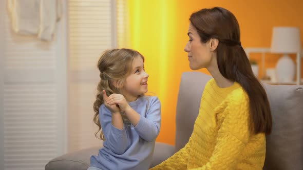 Preschool Girl Telling Happy Mommy Funny Stories