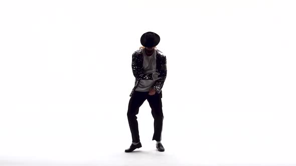 Young Stylish Teenager Is Showing Dance Moves Like Michael Jackson. Isolated Over White Background.