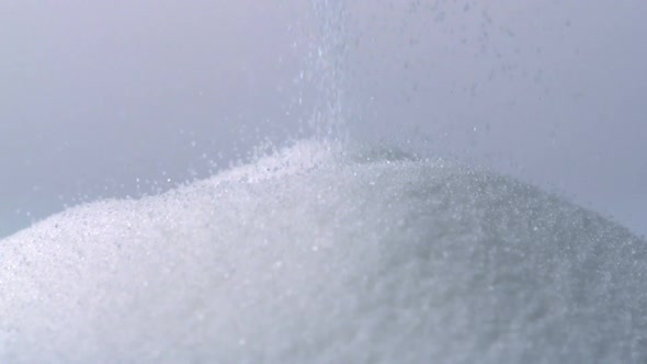 Granules of sugar stack up, Slow Motion