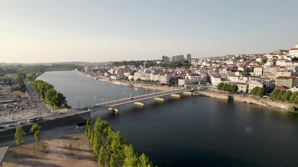 Santa Clara bridge, Modego river and Coimbra cityscape, Portugal