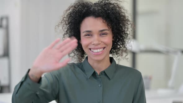 African Woman Waving Welcoming