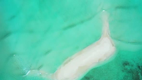 Aerial drone shot sky of paradise resort beach time by turquoise ocean and white sand background of 