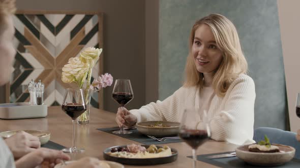 Beautiful Woman Dining In Restaurant