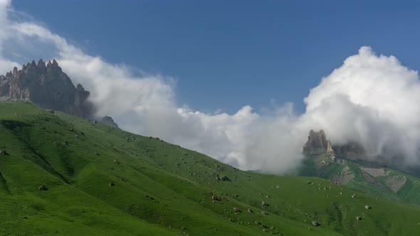 Caucasus Mountains Under Moving Clouds