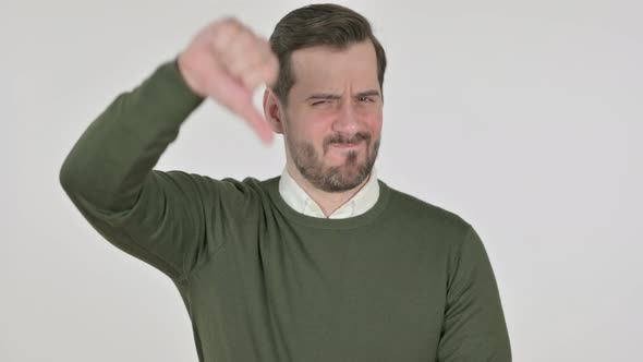 Portrait of Man Showing Thumbs Down Gesture White Screen