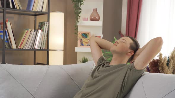 Young man resting at home.