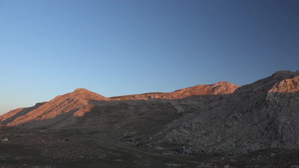 Sunset Shadows in Treeless Simple Mountains