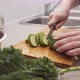 Woman Hands Cutting a Cucumber - VideoHive Item for Sale