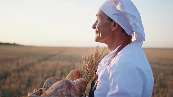 Good Looking Baker Mature Man Holding a Basket