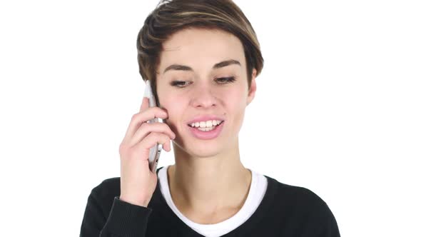 Woman at Work Talking on Smartphone with Customer