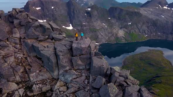 Man and Woman at the Top of the Mountain