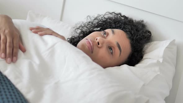 African Woman Waking Up in Morning