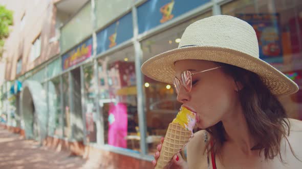 Young girl eating ice cream 