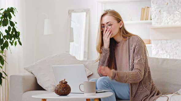 Caucasian Millennial Woman Sitting at Home Looking at Laptop Reads Bad News Receives Rejection Email