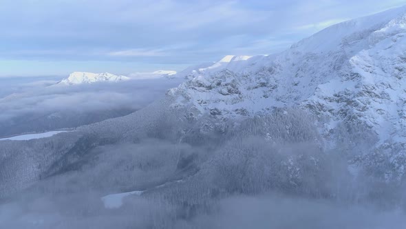 Foggy Valley in Winter Mountain