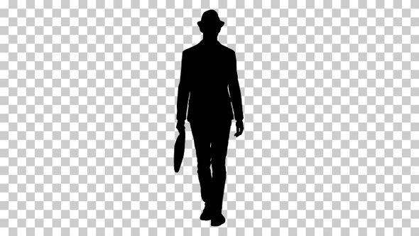 Silhouette Casual arabian man walking in a hat and with