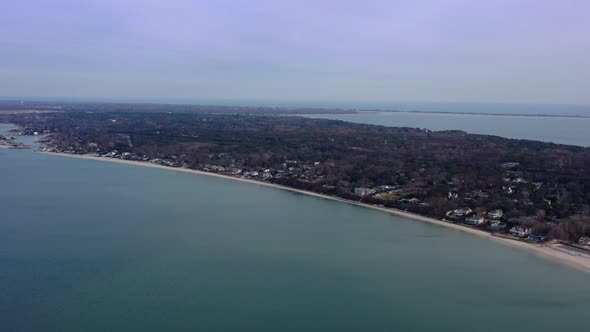 A high angle view over Peconic River looking at Meschutt Beach on Long Island, NY. The camera truck