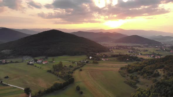 Evening landscape with the sunset and beautiful mountains.