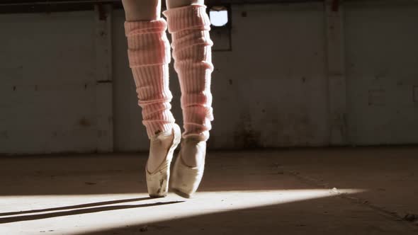 Female dancer in an empty warehouse