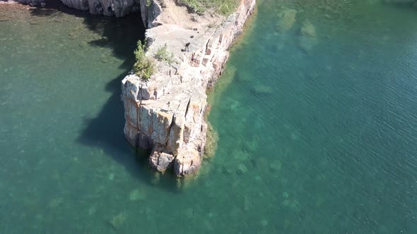 Birds eye vie of a crystal clear blue/ green water at lake superior on a sunny morning