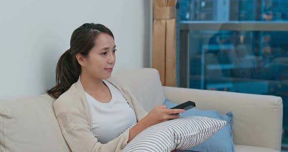 Woman watch tv at home